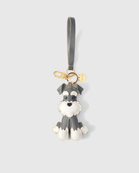 Wear the gray urban schnauzer charm on a bag with the leather strap loop, or clip it to keys with the 18K gold-plated keychain clip.