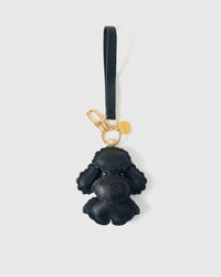 Handmade Poodle leather bag charm with 18K gold-plated keychain clip and engraved STICKYZOO gold tag — for keys, bags, and backpacks. French Alran goatskin.