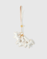 Triple Schnauzer charm handmade from French Alran genuine goatskin and French suede — real full-grain leather from Tarn, since 1903. 3 days of hand-cutting, hand-stitching, hand-layering. Arrives in luxury gift packaging. Designed in Amsterdam.