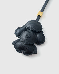 Handmade Poodle leather bag charm — built to last from full-grain French Alran goatskin, hand-layered, hand-stitched. STICKYZOO Amsterdam design.
