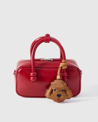 Handmade Poodle leather bag charm with 18K gold-plated keychain clip and engraved STICKYZOO gold tag — for keys, bags, and backpacks. French Alran goatskin.