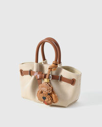 Handmade Poodle leather bag charm — French Alran goatskin from a tannery founded in 1903 in Tarn, France. STICKYZOO.