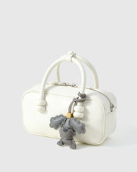 Handmade Poodle leather bag charm — French Alran goatskin from a tannery founded in 1903 in Tarn, France. STICKYZOO.