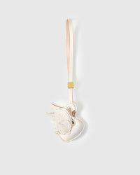 Handmade leather swan bag charm by STICKYZOO — French Alran goatskin hand-layered and hand-stitched by one artisan over 3 days. Handmade leather strap with engraved 18K gold-plated cube. Designed in Amsterdam.