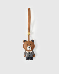 TEDDY BEAR CHARM charm handmade from French Alran genuine goatskin — A teddy bear in a dark grey jacket with a white collar and. Three days by hand. Arrives in luxury gift packaging. Designed in Amsterdam.