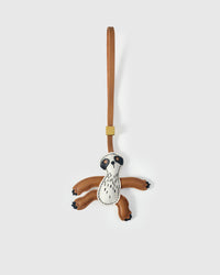 SLOTH CHARM charm handmade from French Alran genuine goatskin — A sloth, arms wide, hanging. White face with dark eye. Three days by hand. Arrives in luxury gift packaging. Designed in Amsterdam.
