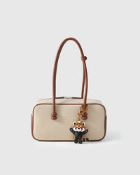 RED PANDA CHARM charm styled on a bag — a small, specific piece that turns a simple bag into a personal one.