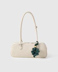 STICKYZOO Lucky Clover Charm — hand-cut, hand-stitched padded heart-shaped petals with contrast stitching in French Alran goatskin. Designed in Amsterdam.