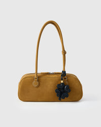 STICKYZOO Lucky Clover Charm — hand-cut, hand-stitched padded heart-shaped petals in French Alran goatskin. Designed in Amsterdam.