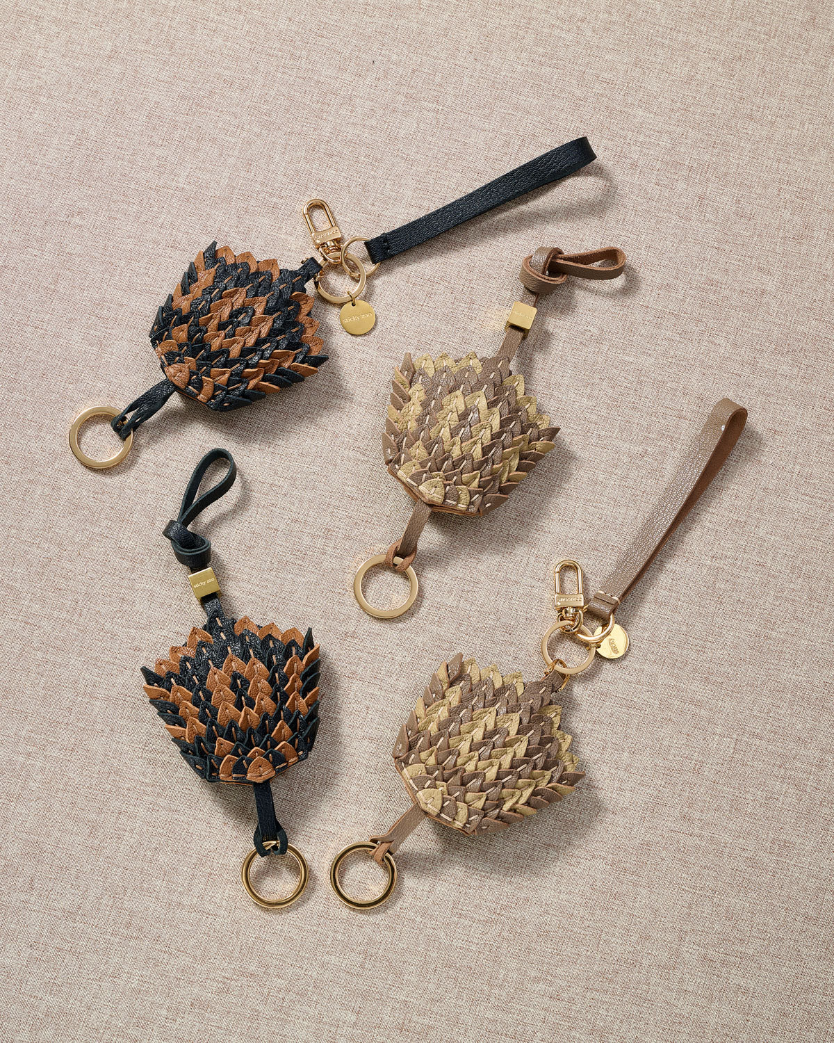 Scaled charm — rated 4.9★ by thousands of buyers. Real French Alran leather.