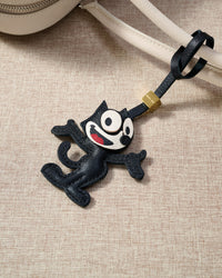 Cartoon Cat on a bag, side angle — loved by thousands of cat people. Real French leather, 3 days by hand.