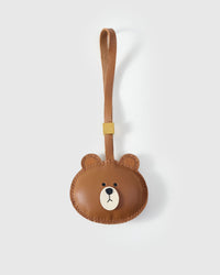 CUDDLY BEAR CHARM charm handmade from French Alran genuine goatskin — A round caramel bear face. No bow. No outfit. No. Three days by hand. Arrives in luxury gift packaging. Designed in Amsterdam.