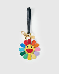 Close-up of STICKYZOO Night Flower Charm — full-grain French Alran goatskin from Tarn, France. Multi-colour petals with smiley face. 3-day handmade piece.