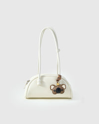 KOALA CHARM charm styled on a bag — a small, specific piece that turns a simple bag into a personal one.