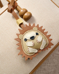 HEDGEHOG CHARM on an 18K gold-plated keychain clip with engraved STICKYZOO disc — clips to keys, bags or backpacks.