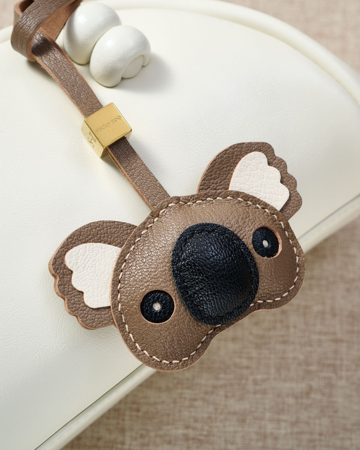 KOALA CHARM — finished one at a time, by hand. Real French Alran goatskin.