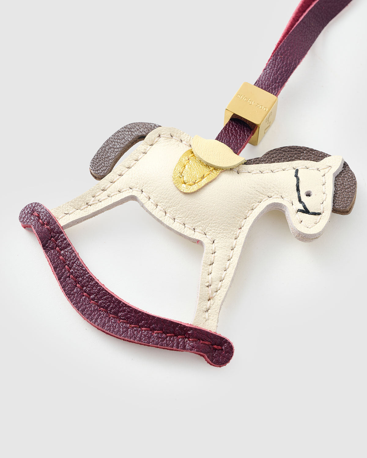 PŘÍVĚSEK HOUPAČKOVÝ KONÍK