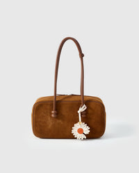 STICKYZOO Daisy Charm in white with orange suede centre — handmade French Alran goatskin with 18K gold-plated hardware. Arrives gift-ready.
