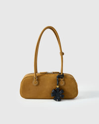 STICKYZOO Daisy Bag Charm in black — handmade French Alran goatskin with 18K gold-plated hardware. Arrives gift-ready.