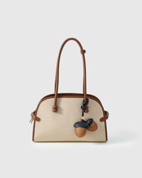 STICKYZOO Acorns Charm in warm tan with dark navy caps — handmade French Alran goatskin with 18K gold-plated hardware. Arrives gift-ready.