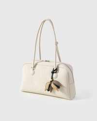 STICKYZOO Tulip Charm with engraved gold hardware cube — handmade French Alran goatskin, gold, taupe, and dark.