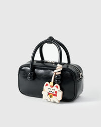 Maneki Neko (Lucky Cat) charm — genuine French Alran goatskin. Never vegan. Never synthetic. The difference shows.