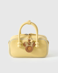 Tan Mickey AirTag holder — Real French leather, 3 days by hand.