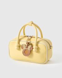 Tan Mickey AirTag holder on an 18K gold-plated keychain clip with engraved STICKYZOO disc — clips to keys, bags or backpacks.