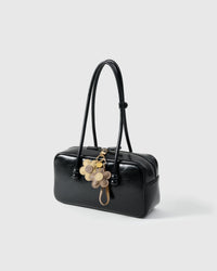 STICKYZOO Twin Flowers Charm — hand-layered French Alran goatskin, twin five-petal blooms on gold keychain. Designed in Amsterdam.