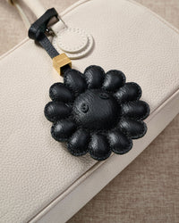 STICKYZOO Night Flower Charm — hand-cut, hand-stitched padded dimensional flower petals in French Alran goatskin. Designed in Amsterdam.
