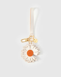 STICKYZOO Daisy Charm in white with orange suede centre French Alran goatskin. Hand-cut, hand-stitched. Designed in Amsterdam.