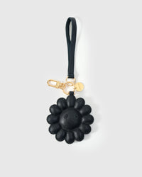 STICKYZOO Night Flower Charm in all-black French Alran goatskin. Hand-cut, hand-stitched. Designed in Amsterdam.