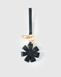 STICKYZOO Daisy Bag Charm in warm taupe — handmade French Alran goatskin, hand-cut and hand-stitched over 3 days.