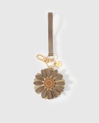 Close-up of STICKYZOO Daisy Charm — full-grain French Alran goatskin from Tarn, France. Layered daisy petals with tan centre. 3-day handmade piece.