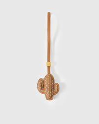 STICKYZOO Cactus Charm in warm tan French Alran goatskin — hand-cut saguaro silhouette with cream cross-stitch spine detail. 3-day handmade piece.