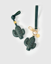 STICKYZOO Cactus Charm — hand-layered French Alran goatskin, saguaro silhouette with cream cross-stitch. Designed in Amsterdam.