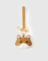 Persian cat on an 18K gold-plated keychain clip with engraved STICKYZOO disc — clips to keys, bags or backpacks.