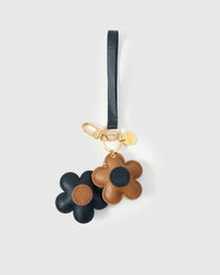 STICKYZOO Twin Flowers Charm — mixed navy and caramel French Alran goatskin blooms with contrast centres, gold keychain clip. 3-day handmade piece.