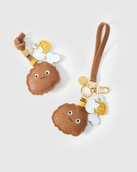 Chicken wing charm — finished one at a time, by hand. Real French Alran goatskin.
