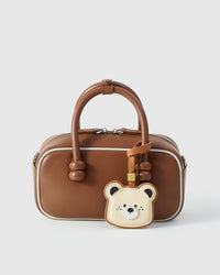 Toast Bear — finished one at a time, by hand. Real French Alran goatskin.