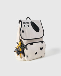 STICKYZOO Skater Pup Backpack side profile in sky blue showing front pocket, dachshund face flap, and leather charm bundle