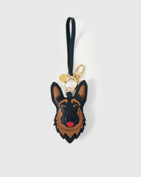 Handmade German Shepherd leather bag charm with 18K gold-plated keychain clip and engraved STICKYZOO gold tag — for keys, bags, and backpacks. French Alran goatskin.