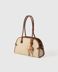 Jellyfish charm detail — tentacles cut one by one from real French leather, not printed, not molded.