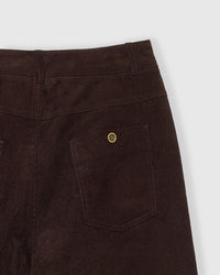 Close-up of back pocket with gold-tone rivet on brown corduroy Bears on the Cords pants