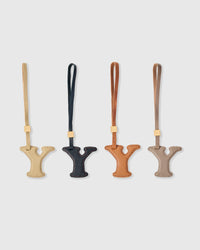 Y initial charm handmade from French Alran genuine goatskin leather. Three days of hand-cutting, layering and stitching. A thoughtful gift for names starting with Y — Yara, Yusuf, Yvonne, Yael, Yuri. Arrives in luxury gift packaging. Designed in Amsterdam.