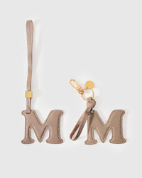 Signature 18K gold-plated hardware, engraved with the STICKYZOO mark. Finished by hand. Designed in Amsterdam.