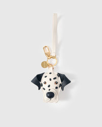 Dalmatian Luxe leather bag charm shown in both attachment options — handmade French Alran goatskin, dual attachment for bags or keys. STICKYZOO Amsterdam design.