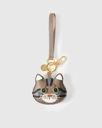 Tabby cat on an 18K gold-plated keychain clip with engraved STICKYZOO disc — clips to keys, bags or backpacks.