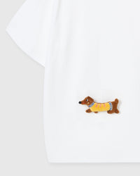 Detail of plush dachshund on body of STICKYZOO white Dachshund Parade T-Shirt showing hand-stitched 3D detail