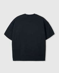 Back view of STICKYZOO Mushroom T-Shirt in black showing oversized boxy fit